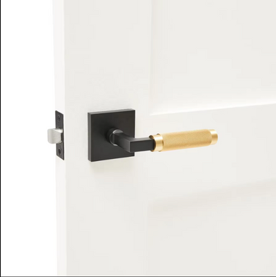 Zurich-Door handle lock black with brushed gold knurled