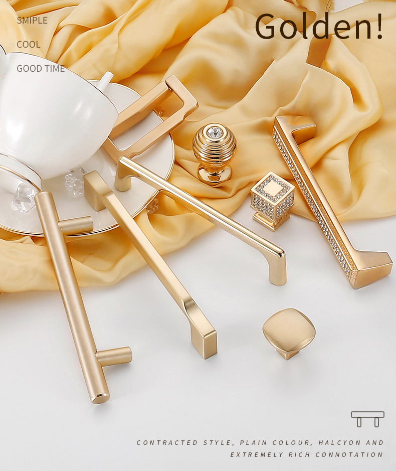 Gold polished cabinet door handles and knobs