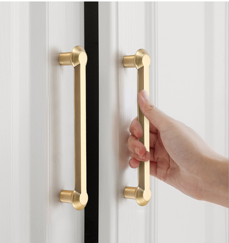 Gold polished cabinet door handles and knobs