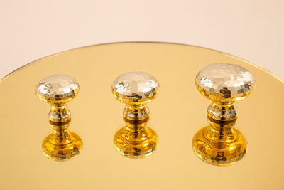 Nordic Gold Polished Hand Hammered Cabinet door handles and knobs.