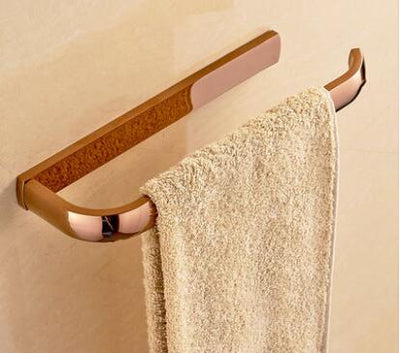 Rose gold polished bathroom accessories