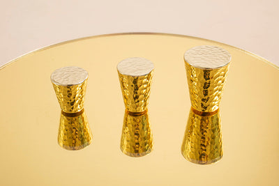 Nordic Gold Polished Hand Hammered Cabinet door handles and knobs.