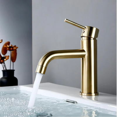 Brushed gold round clean sleek single hole bathroom faucet