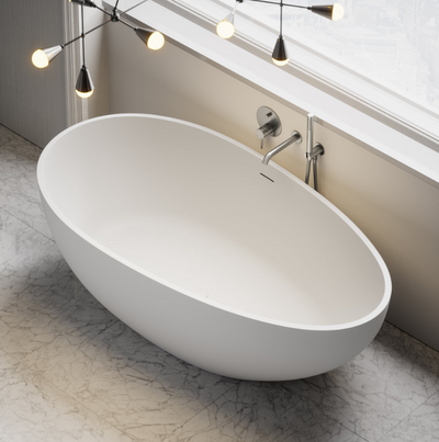White matte solid stone freestanding tub 55"