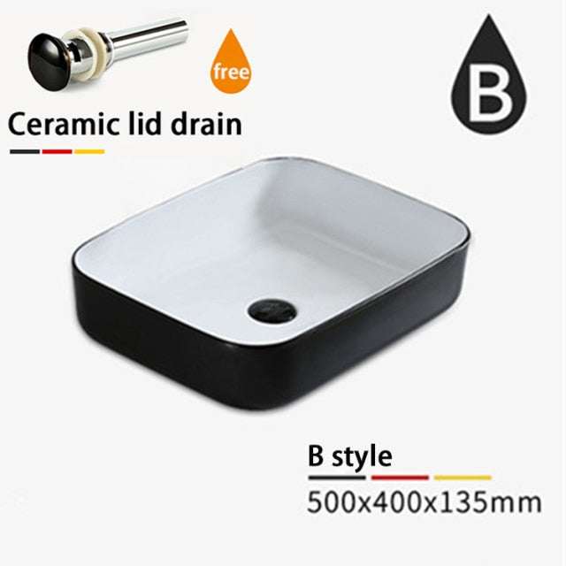 Black with white vessel sink