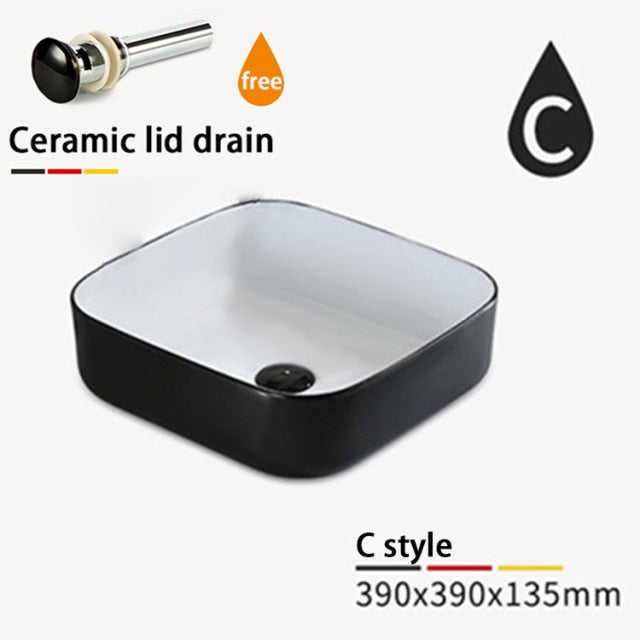 Black with white vessel sink