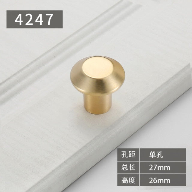 Gold polished cabinet door handles and knobs