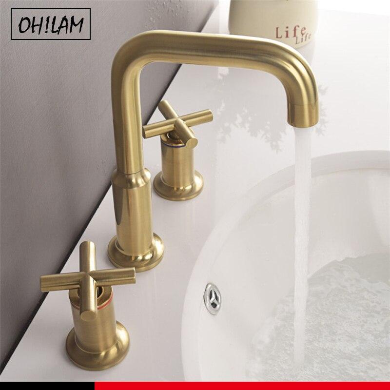 Brushed gold 8" inch wide spread faucet with cross handle